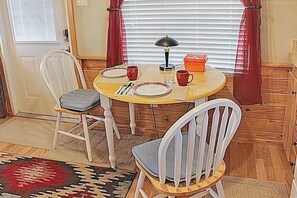 Enjoy your meal at the table looking out at the Peloncillo Mountains.