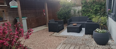Petit coin cosy avec salon jardin