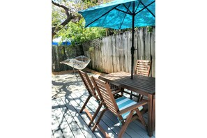 Enjoy a backyard BBQ or a nap in the hammock!