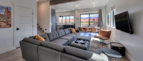 Main living and dining area showing the exceptional views. 