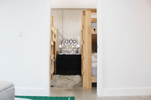 Entrance to the Bunk Room with sliding door for privacy.