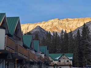 Sun setting on the mountains behind the complex