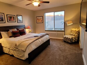 Master Bedroom King Bed, Rollaway, 4 Blow up Beds in Closet.  Sony TV, Moab Art