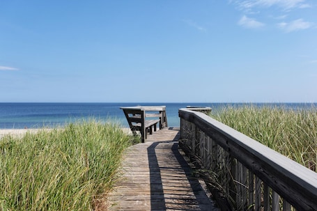 Boardwalk to the private neighborhood beach
