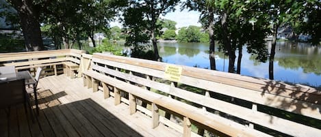 Enjoy relaxing on the large deck overlooking the lake