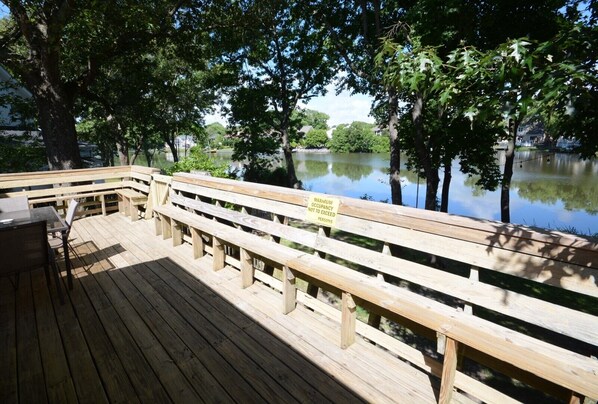 Enjoy relaxing on the large deck overlooking the lake