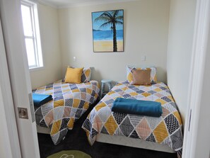 Twin bedroom with 2 king single comfy beds.