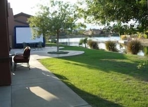 Outdoor Movie Screen Back Yard Lake and Mountain View