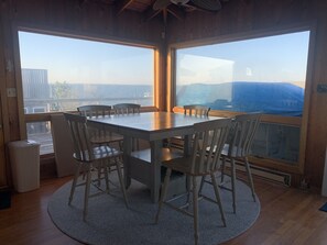Seating for 8 at the table and a counter with 4 stools as well.