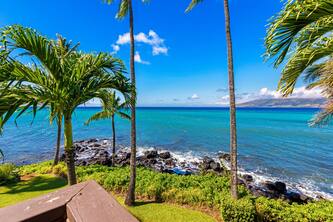 Stylish, oceanfront retreat with scenic balcony, pool & fast WiFi