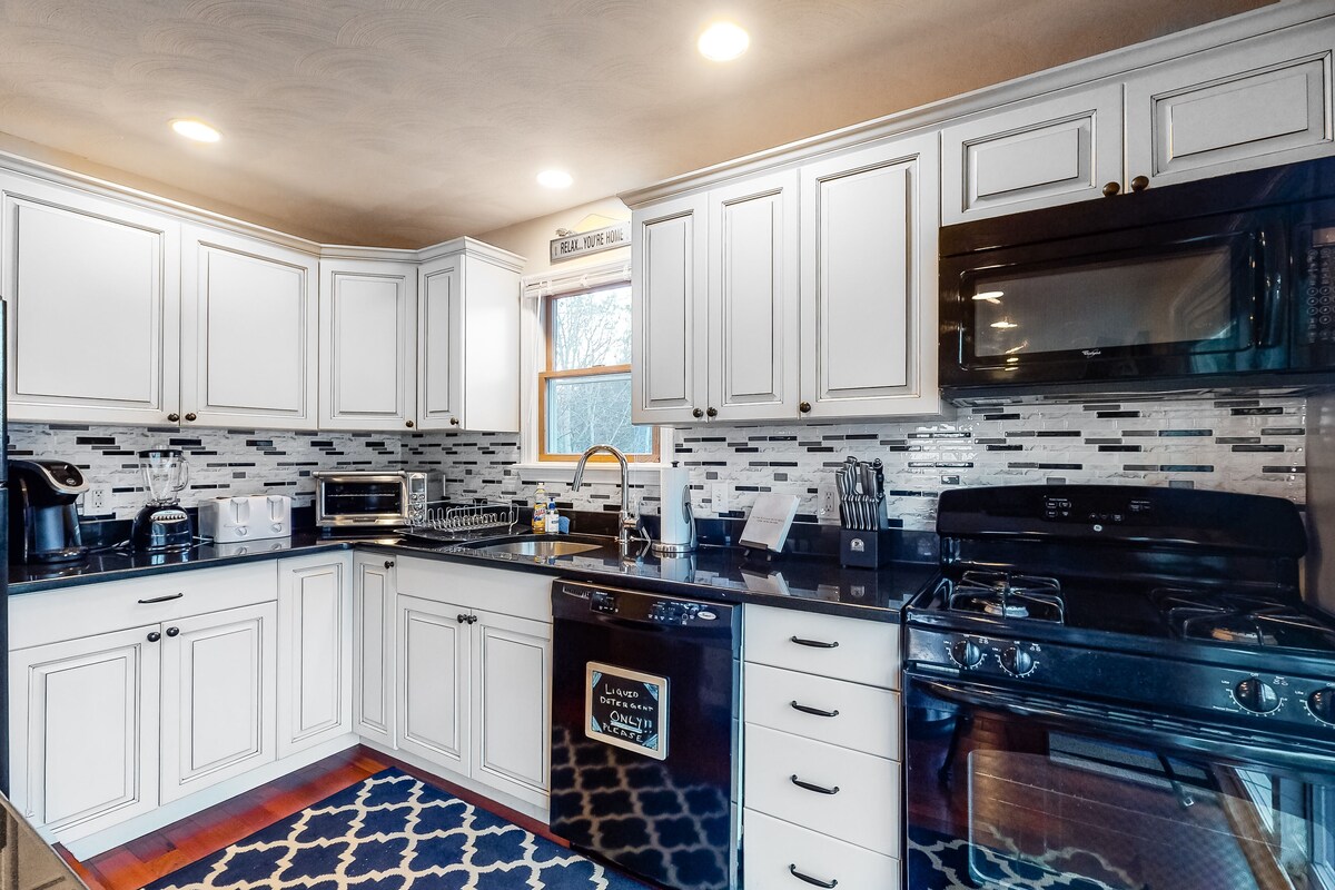 Wonderful three-story home with lovely decks, firepit, fast WiFi & washer/dryer
