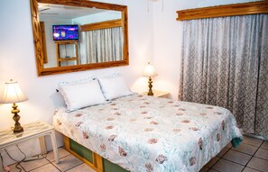 Master bedroom with queen-size bed and Roku-enabled 32' HDTV
