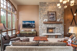 Relax by the fire and watch a movie after a day of skiing or hiking.