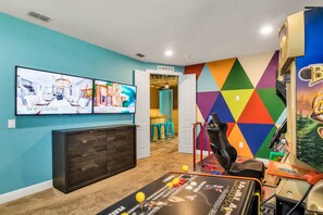 Game room with Dance Dance Revolution and other arcades