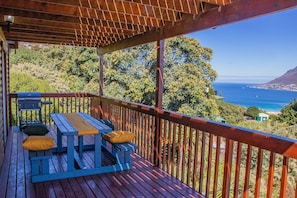 Lower deck with picnic table and views over False Bay