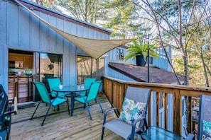 Enjoy the back deck sitting up in the trees