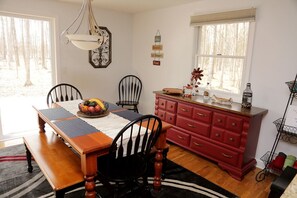 Table seating for six to eight guests, and two at the snack bar