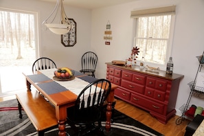 Table seating for six to eight guests, and two at the snack bar