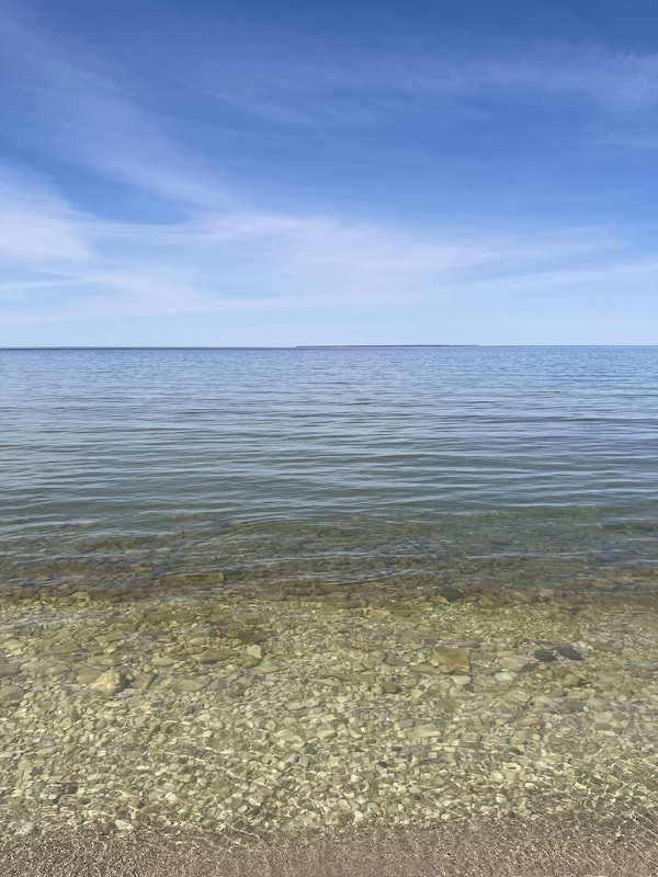 Peaceful shoreline and waters of Green Bay