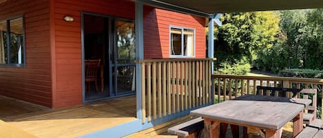 Large outdoor deck with shade cloth 