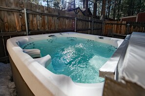 Private Hot Tub Retreat – Relax in the large hot tub with twinkling lights