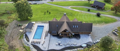 Eagle Manor 4,000 sq ft paver patio, pool, + pool house (ready winter 2023)