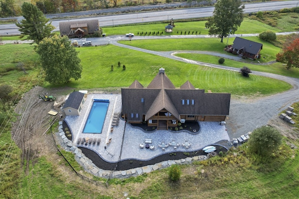 Eagle Manor 4,000 sq ft paver patio, pool, + pool house (ready winter 2023)