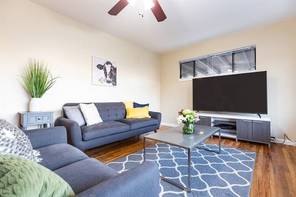 Big TV to enjoy a movie night with your friends and family in this comfy gathering area.