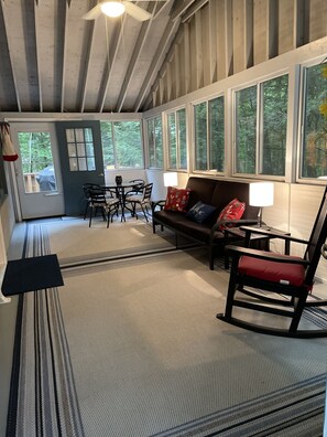 Dine or just chill in the enclosed porch