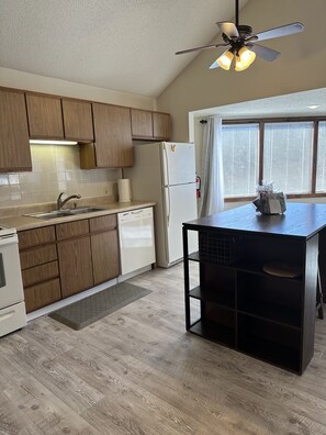 Kitchen with Island and Extra Seating. 
