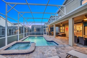 Calming Private Pool of the Home in Reunion Florida - The private pool and spa offer an exclusive oasis of relaxation and indulgence - Thoughtful lighting for day and night use