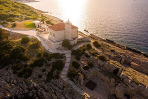The view of estate of Vis luxury rental villa Lighthouse Ligero by the sea with jacuzzi with complete privacy