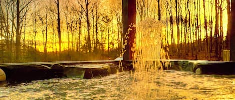 Sunrise in winter often brings bright colors, soak it in from a hot tub