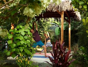 An exterior deck for your morning yoga, immersed in pure nature.