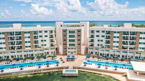Our beautiful view at Sunset Caribe. The lobby is located in the center building