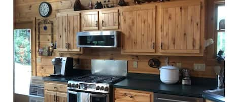 Full kitchen with dishes, utensils, cookware, Keurig and many other necessities!