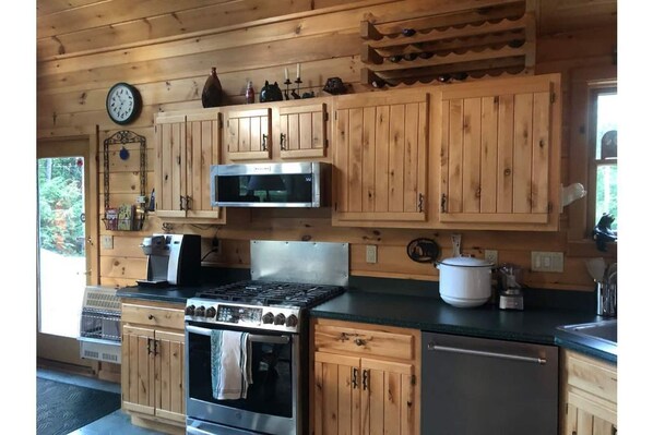 Full kitchen with dishes, utensils, cookware, Keurig and many other necessities!