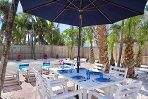 Have a meal pool side with plenty of seating