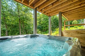 Hot Tub Living - Let the warm jets work away the stress and soreness of a long day of adventures in Deep Creek Lake.