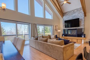 Living room with gas fireplace and Smart TV