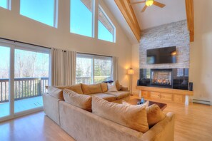 Living room with gas fireplace and Smart TV