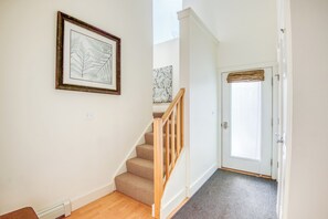 Entryway and stairs that lead to the loft