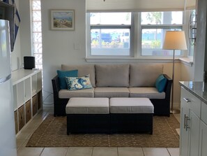 Cozy living room with the bay view out the windows.