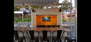 Dock bar with its' own wifi, bluetooth sound system, smart TV, and refrigerator.