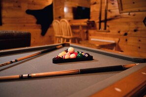 Shoot some pool on our regulation size pool table.