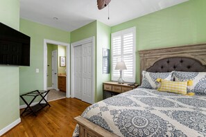 First floor bedroom with a Queen bed and TV! Half bathroom is right next to it.