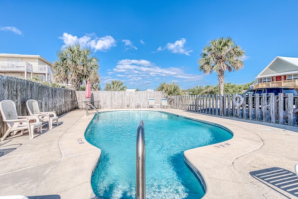 Outdoor Pool at Alabama Sands Complex - An outdoor, communal pool is featured at Alabama Sands, and offers seating for enjoying time in the sun.