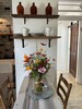 Seating for Two Indoors And 4 Outside on covered porch