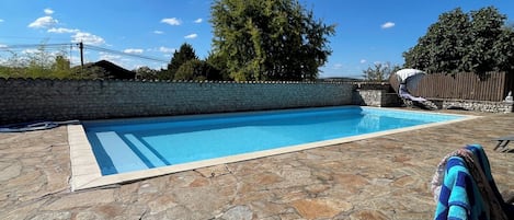 The pool had a new liner installed in 2024, with full width pool steps.