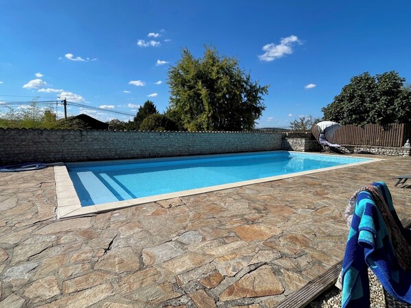 The pool had a new liner installed in 2024, with full width pool steps.